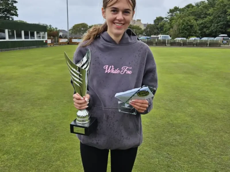 Katie Jacobs with her winner's trophy.